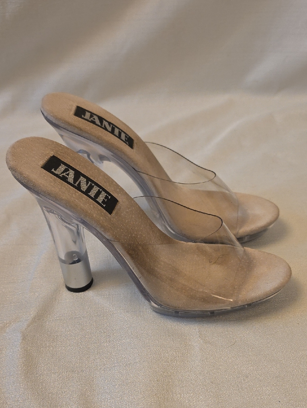 JANIE Clear Vinyl Mule Heels in Nude